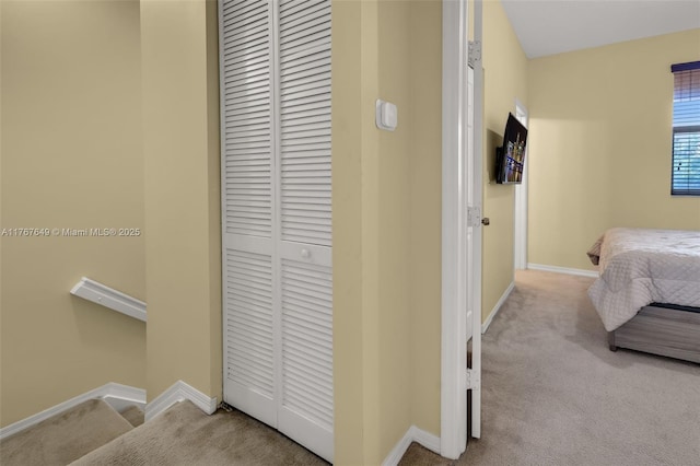 983 SW 143rd Ave Unit 1403, Pembroke Pines, FL 33027 - carpeted bedroom with a closet and baseboards