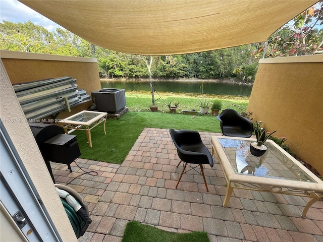 983 SW 143rd Ave Unit 1403, Pembroke Pines, FL 33027 - view of patio / terrace with a water view
