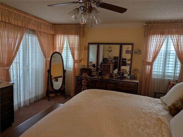 2334 S Cypress Bend Dr Unit 602, Pompano Beach, FL 33069 - carpeted bedroom with ornamental molding, a ceiling fan, and a textured ceiling