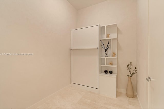 bathroom featuring baseboards
