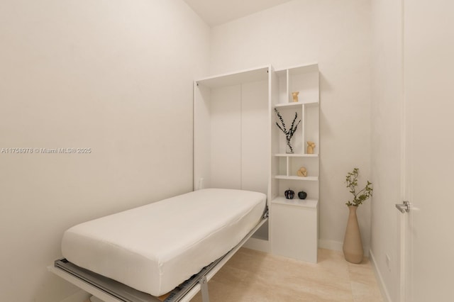 bedroom with baseboards
