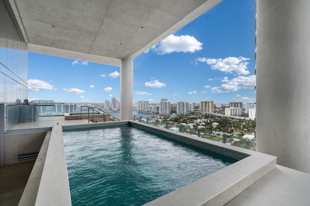 view of pool featuring a city view