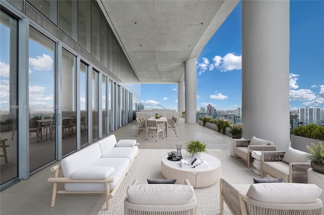 view of patio featuring outdoor dining space and an outdoor living space