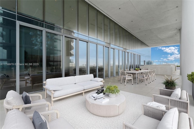 view of patio / terrace with outdoor lounge area and outdoor dining area
