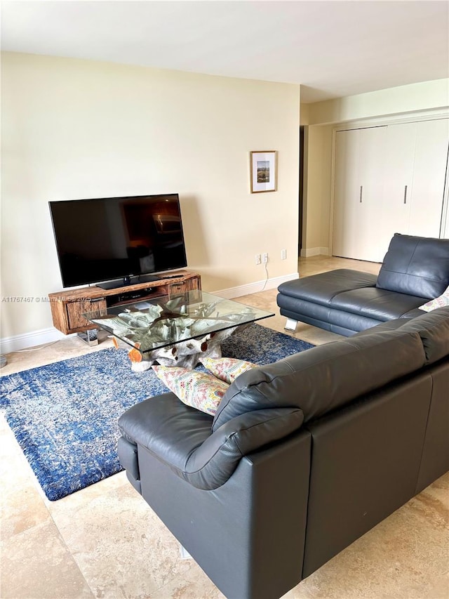 10410 S Ocean Dr Unit 504, Jensen Beach, FL 34957 - living area with baseboards