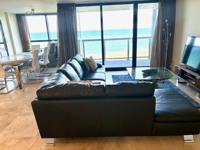 10410 S Ocean Dr Unit 504, Jensen Beach, FL 34957 - living room with a water view