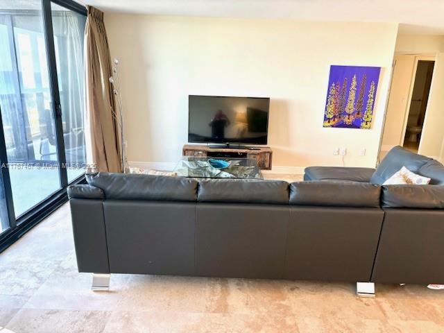 10410 S Ocean Dr Unit 504, Jensen Beach, FL 34957 - living area with plenty of natural light