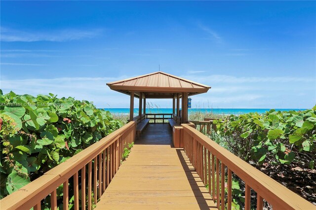 10410 S Ocean Dr Unit 504, Jensen Beach, FL 34957 - surrounding community featuring a gazebo and view of water and beach