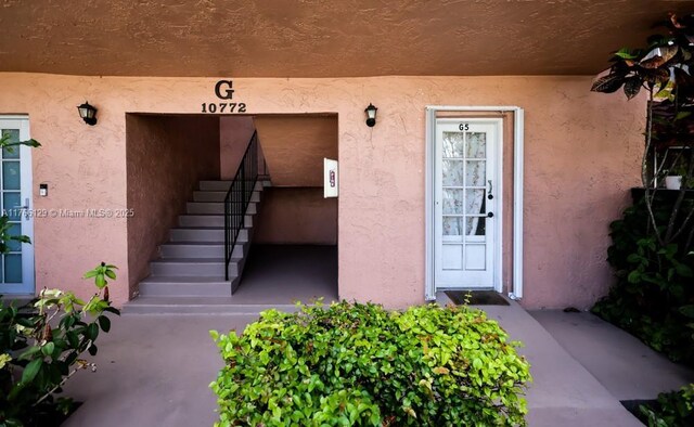10772 N Kendall Dr Unit G5, Miami, FL 33176 - doorway to property featuring stucco siding