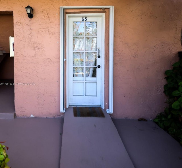 10772 N Kendall Dr Unit G5, Miami, FL 33176 - view of exterior entry featuring stucco siding