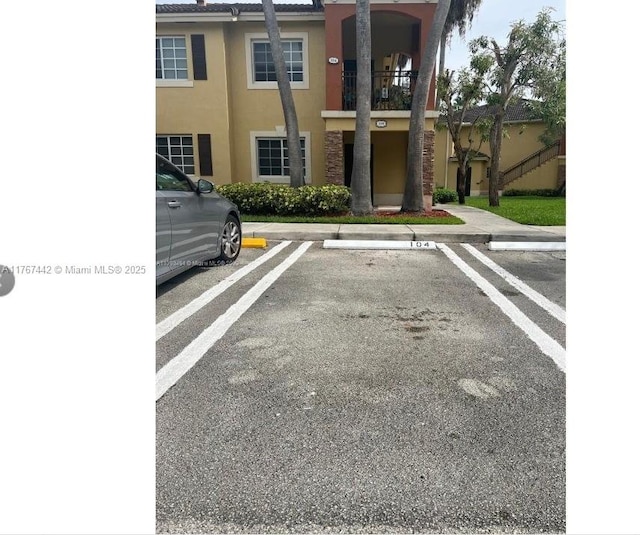 view of uncovered parking lot