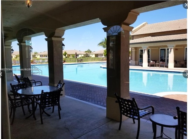 pool featuring a patio area
