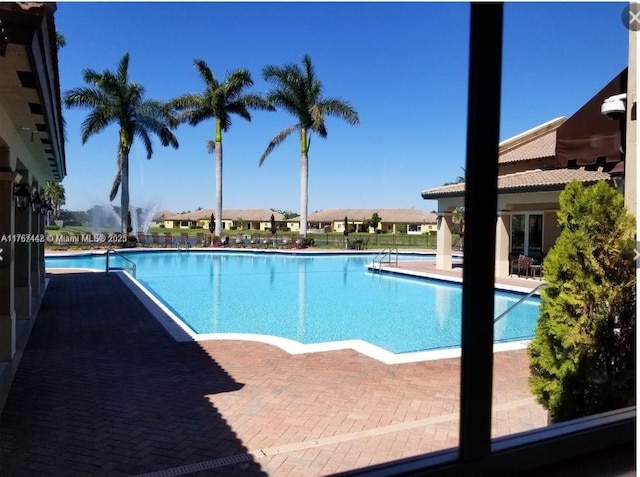 pool featuring a patio