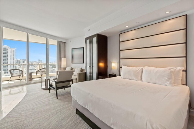 4391 Collins Ave Unit 1618, Miami Beach, FL 33140 - bedroom with expansive windows, a view of city, recessed lighting, and access to outside