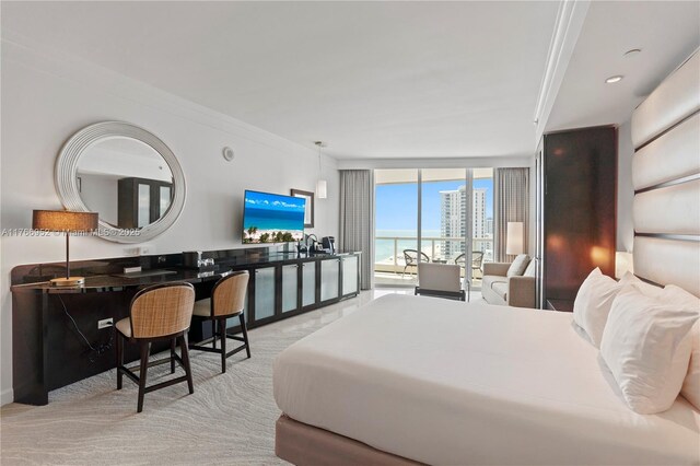 4391 Collins Ave Unit 1618, Miami Beach, FL 33140 - carpeted bedroom with crown molding, access to exterior, expansive windows, and recessed lighting