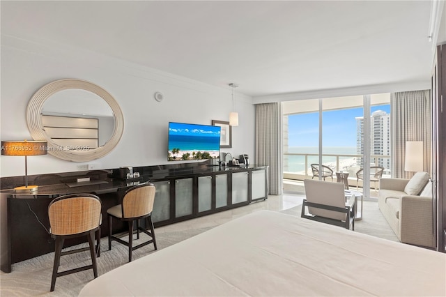 4391 Collins Ave Unit 1618, Miami Beach, FL 33140 - interior space featuring floor to ceiling windows, ornamental molding, and a sink