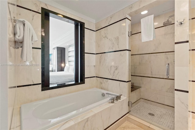 4391 Collins Ave Unit 1618, Miami Beach, FL 33140 - ensuite bathroom with a bath, tile walls, connected bathroom, and a stall shower