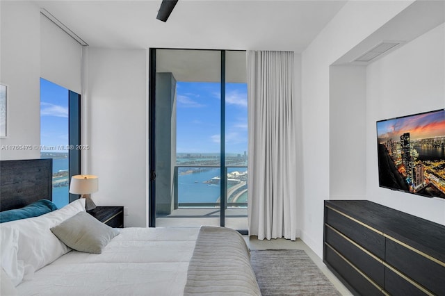 601 NE 1st Ave Unit 5115, Miami, FL 33132 - bedroom with floor to ceiling windows, access to outside, and ceiling fan