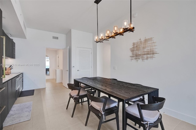 601 NE 1st Ave Unit 5115, Miami, FL 33132 - dining area featuring a chandelier and baseboards