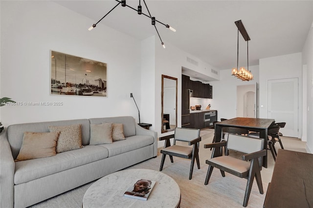 601 NE 1st Ave Unit 5115, Miami, FL 33132 - living room featuring a chandelier