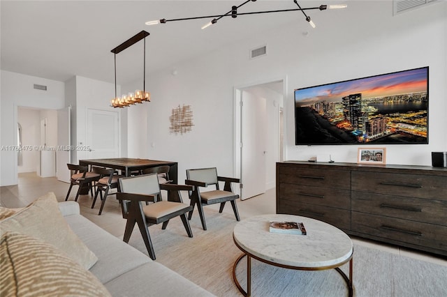 601 NE 1st Ave Unit 5115, Miami, FL 33132 - living room featuring a chandelier