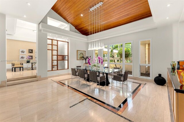 665 Leucadendra Dr, Coral Gables, FL 33156 - dining area featuring baseboards, high vaulted ceiling, recessed lighting, and wood ceiling