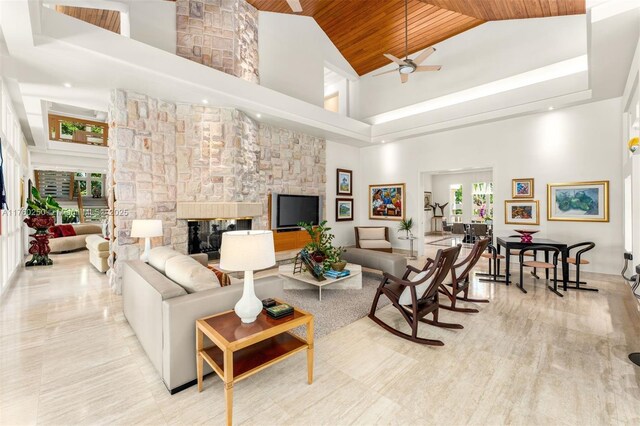 665 Leucadendra Dr, Coral Gables, FL 33156 - living room featuring ceiling fan, high vaulted ceiling, wood ceiling, and a wealth of natural light