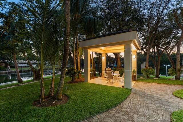 665 Leucadendra Dr, Coral Gables, FL 33156 - view of home's community with a water view, a gazebo, a yard, and a patio