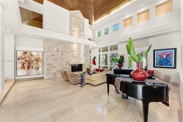 665 Leucadendra Dr, Coral Gables, FL 33156 - living area with a high ceiling and a fireplace