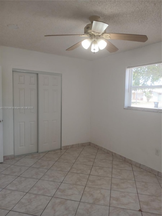 6464 Johnson St, Hollywood, FL 33024 - unfurnished room with a textured ceiling and ceiling fan