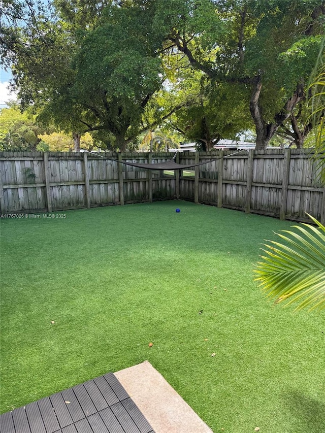 view of yard featuring fence