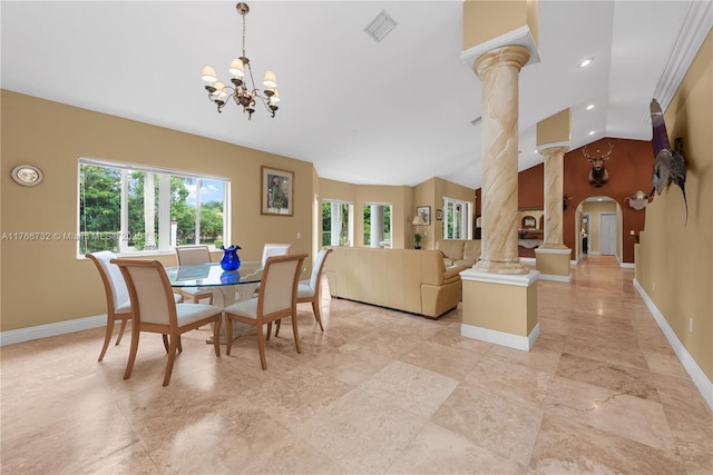 dining area featuring a notable chandelier, decorative columns, baseboards, and visible vents