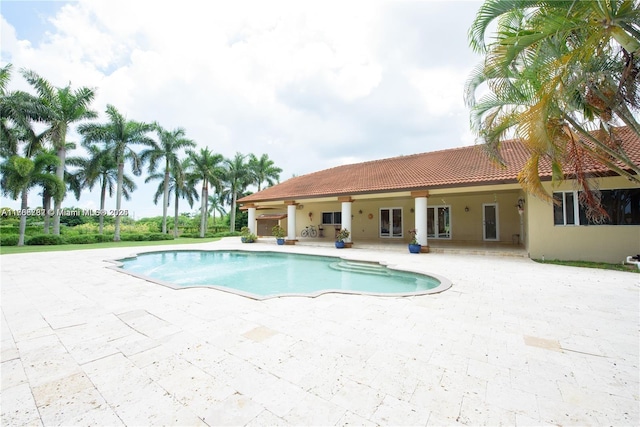 pool with a patio area