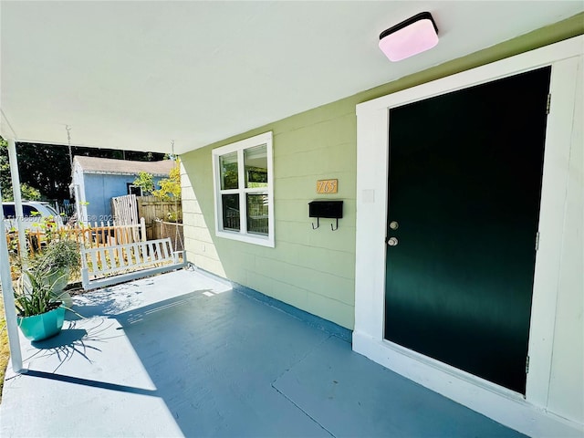 exterior space featuring covered porch