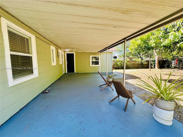 view of patio / terrace featuring fence