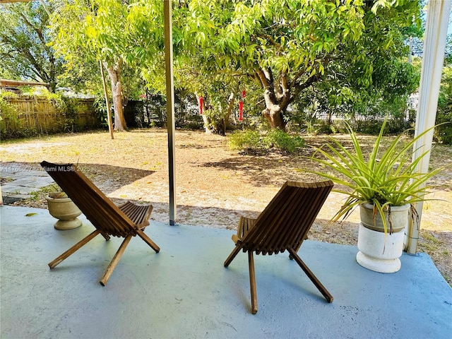 view of patio with fence