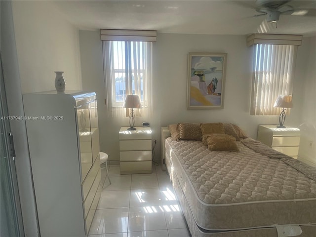 2910 Point E Dr Unit M414, Aventura, FL 33160 - bedroom with light tile patterned floors