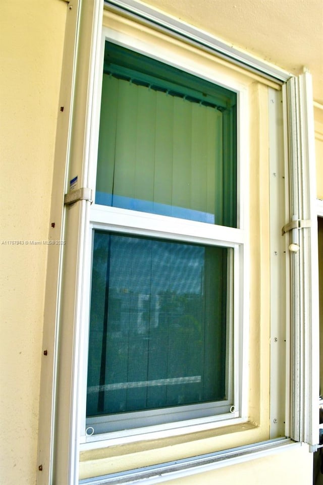 exterior details featuring stucco siding