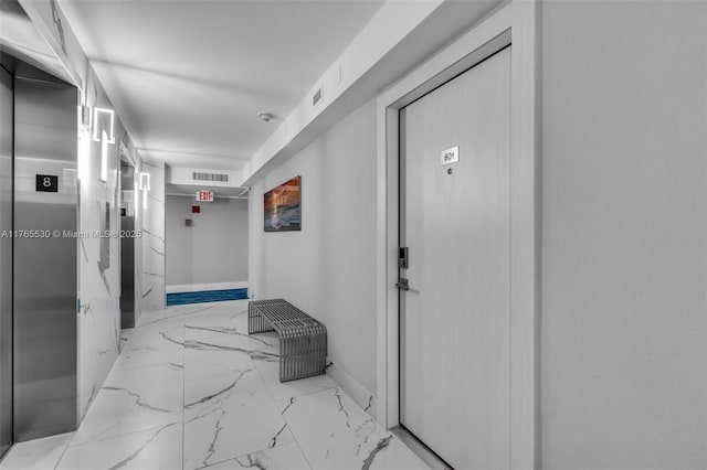 1904 S Ocean Dr Unit 801, Hallandale Beach, FL 33009 - hallway with elevator, visible vents, marble finish floor, and baseboards
