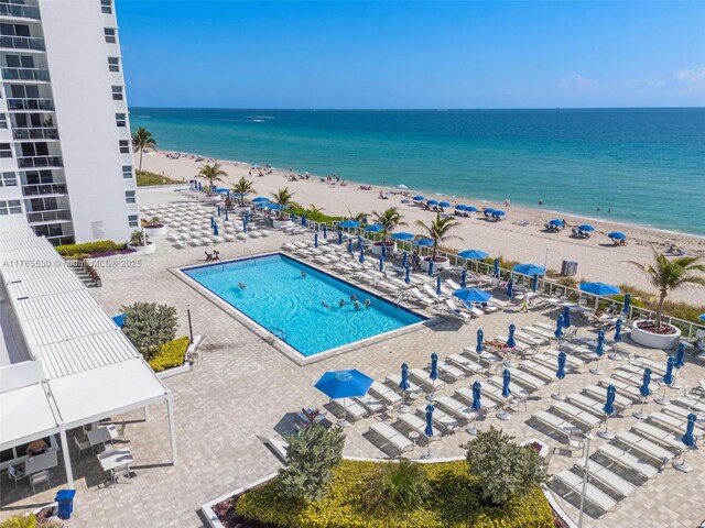 1904 S Ocean Dr Unit 801, Hallandale Beach, FL 33009 - community pool with a patio, a water view, and a view of the beach