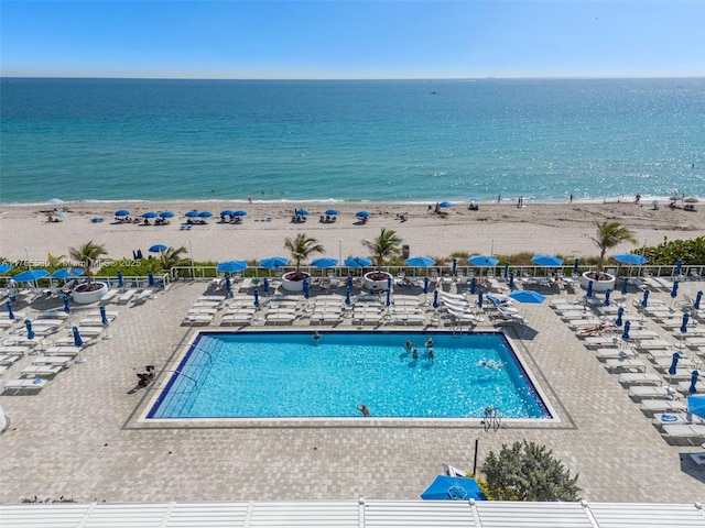 1904 S Ocean Dr Unit 801, Hallandale Beach, FL 33009 - pool with a beach view, a water view, fence, and a patio area