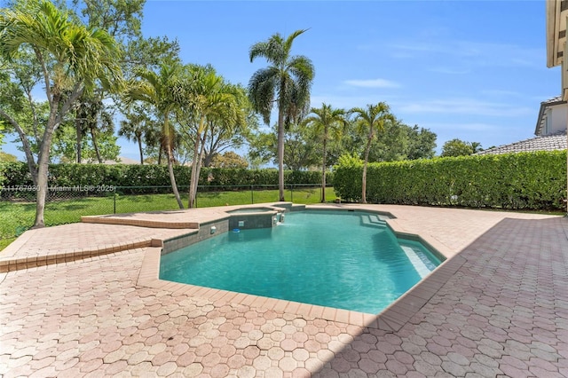 16831 SW 6th St, Pembroke Pines, FL 33027 - view of swimming pool featuring a patio, a fenced backyard, and a pool with connected hot tub