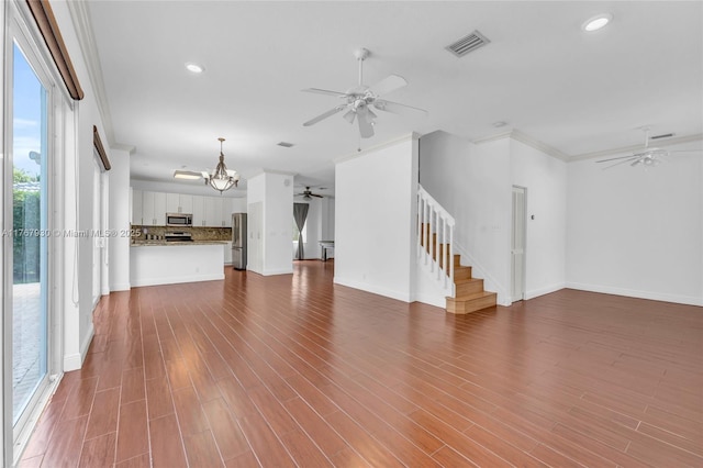 16831 SW 6th St, Pembroke Pines, FL 33027 - unfurnished living room with ceiling fan, stairs, a chandelier, baseboards, and recessed lighting