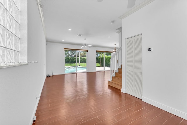 16831 SW 6th St, Pembroke Pines, FL 33027 - unfurnished room with a ceiling fan, baseboards, stairway, recessed lighting, and wood finished floors
