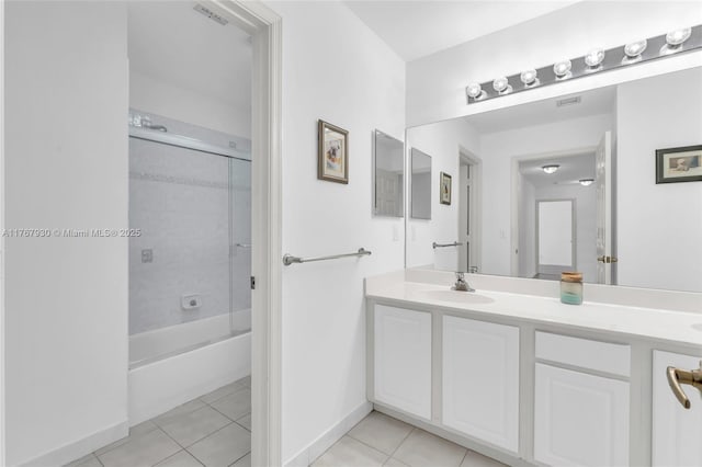16831 SW 6th St, Pembroke Pines, FL 33027 - bathroom with tile patterned floors, baseboards, vanity, and tub / shower combination