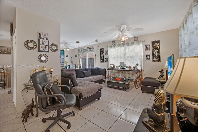 265 NE 12th Ave Unit 265, Homestead, FL 33030 - living room with a ceiling fan, a textured ceiling, and light tile patterned flooring