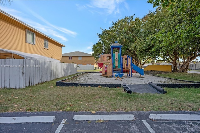 265 NE 12th Ave Unit 265, Homestead, FL 33030 - community jungle gym with a yard and fence