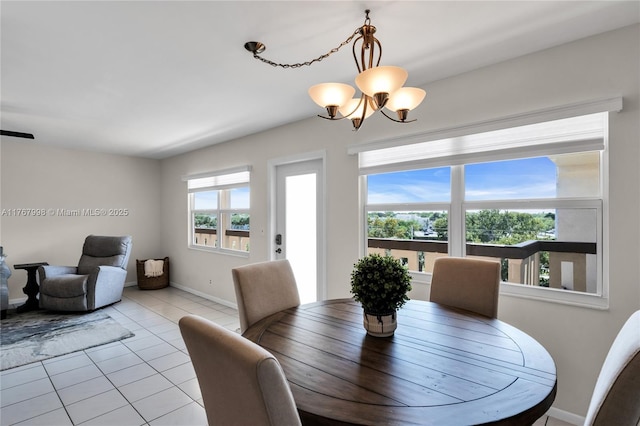 4032 Farnham O Unit 4032, Deerfield Beach, FL 33442 - tiled dining space with a chandelier and baseboards