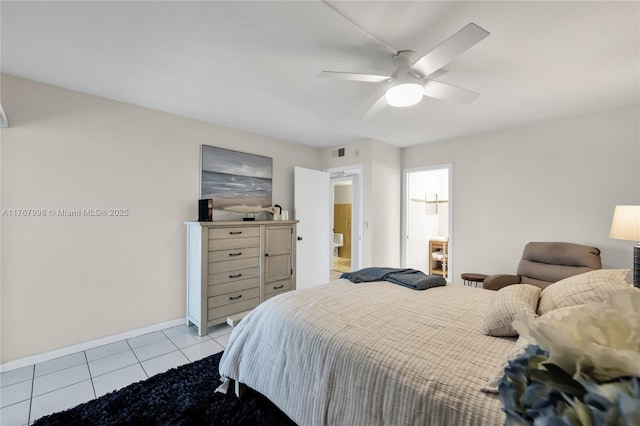 4032 Farnham O Unit 4032, Deerfield Beach, FL 33442 - bedroom with light tile patterned floors, baseboards, a ceiling fan, and connected bathroom