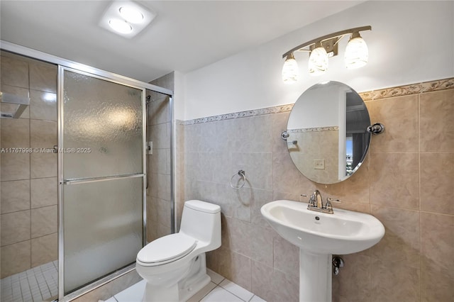 4032 Farnham O Unit 4032, Deerfield Beach, FL 33442 - bathroom with tile walls, toilet, a stall shower, and tile patterned floors